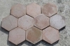 Clinker floor tiles with a modified "rough" surface in shades of brown
